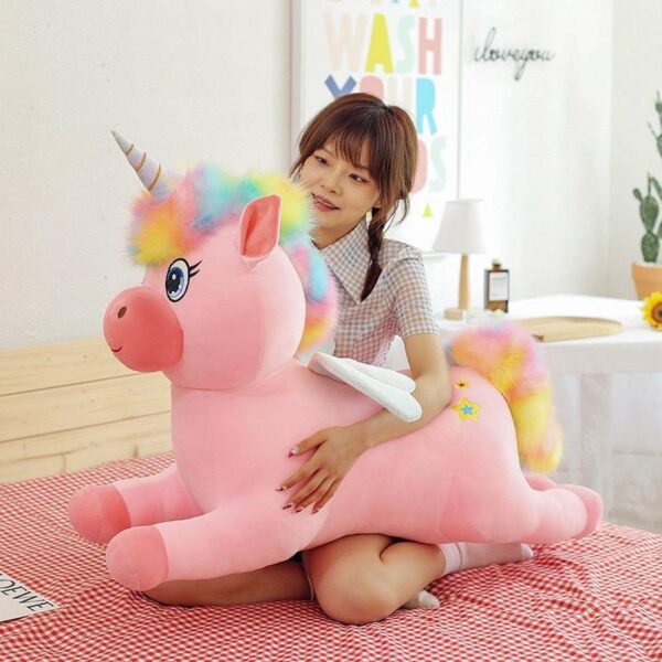 03489986-121c-4769-bf0f-09358ee5f470.jpg Adorable peluche licorne colorée