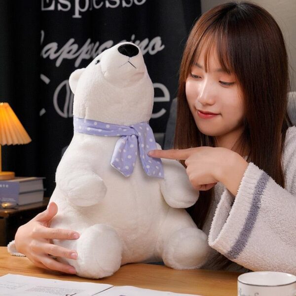 0d32bc68-1c33-4040-9638-30cf23d57a23.jpg Peluche Ours polaire assis avec écharpe