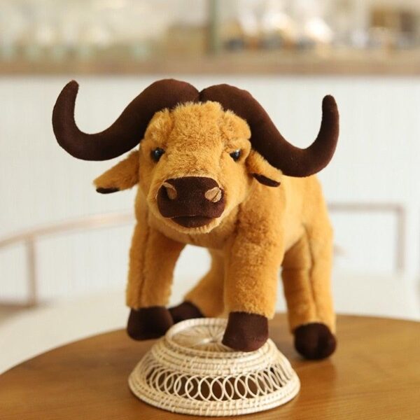 Peluche vache à longues cornes