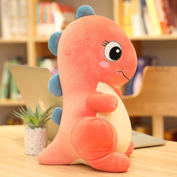 Grosse peluche dinosaure aux grands yeux