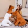 Poupées en peluche cheval assis