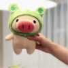 Jouets en peluche cochon mignon qui se transforme en lapin grenouille