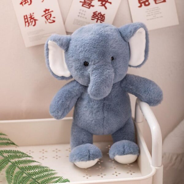 46ed0f47-6943-4c2b-a044-75af5b74c388.jpg Peluche Eléphant