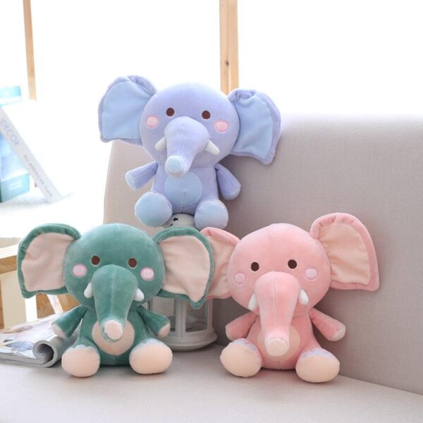 7705f7c4-ce76-4ea4-ac79-2e4810b7b744.jpg Animaux en peluche petit éléphant assis