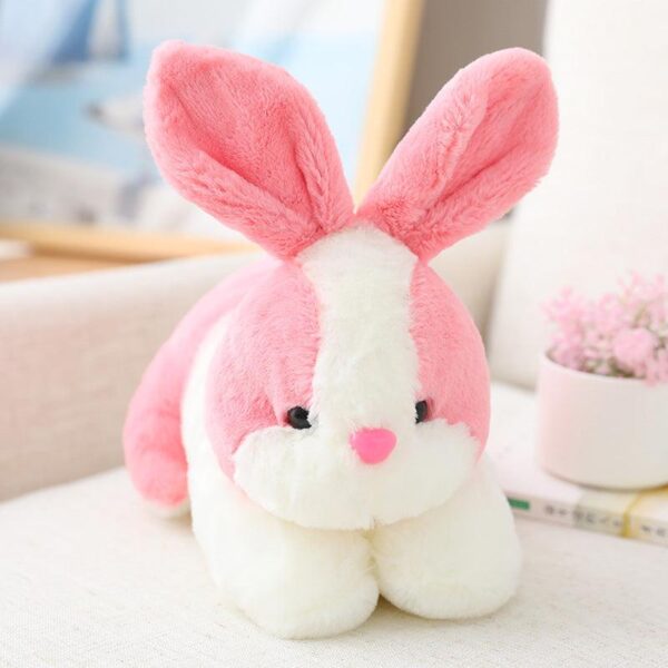 Poupée lapin en peluche