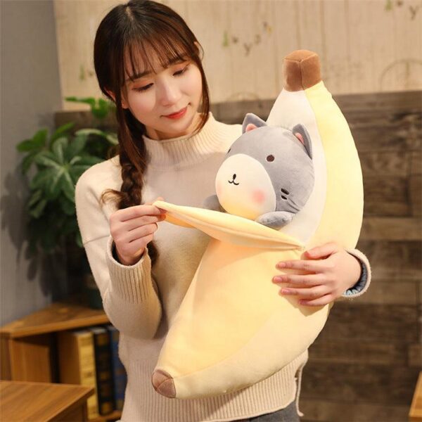 Jouet peluche créatif en forme de cochon qui pèle les bananes