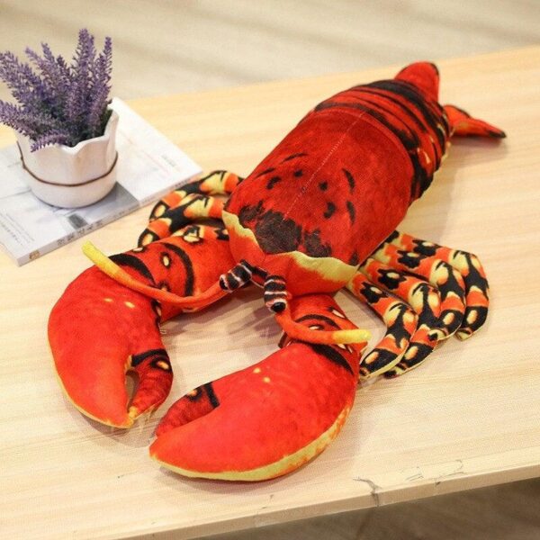 82fb47fd-5d08-40f7-a473-087bee36bd86_1598c697-ee7e-437f-a44f-3525e3498e09.jpg Grande peluche homard réaliste
