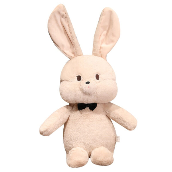 9321bee4-0d5b-484e-a4f4-bc4a5e6c30e8.jpg Peluche lapin avec nœud papillon