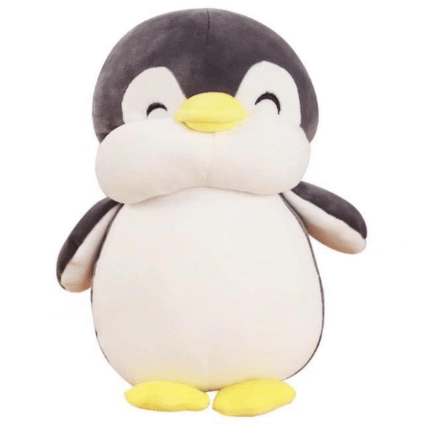 Poupée en peluche pingouin heureux et potelé