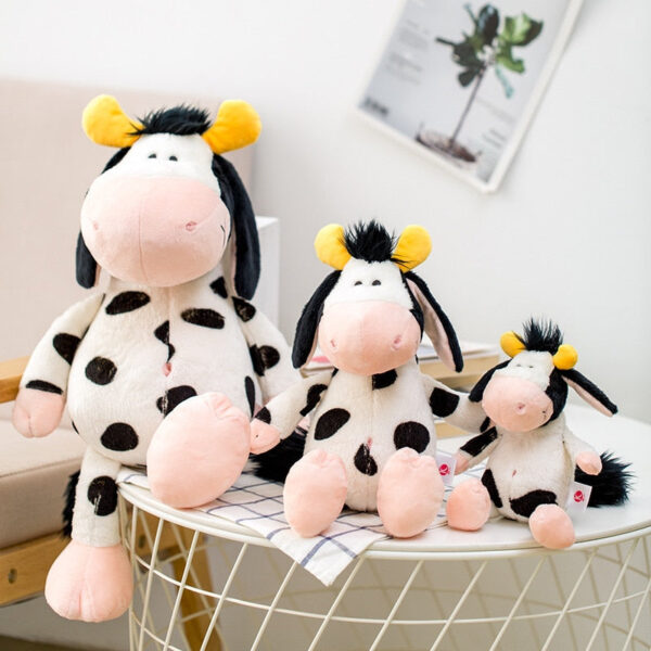 H1bb508412d194127b19d556886cc8a6c1.jpg Peluche Funky la vache
