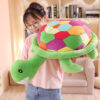 Peluche Tortue arc-en-ciel souriante