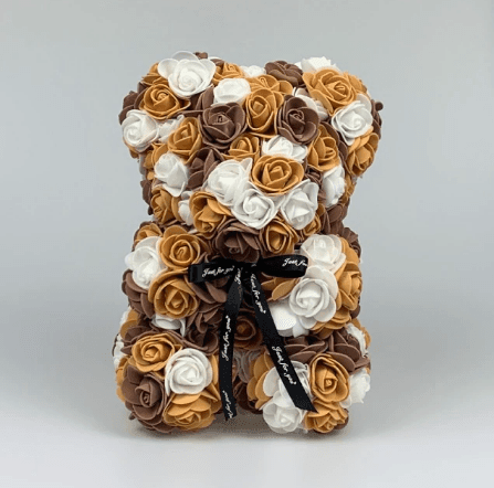 Ourson en roses marron et blanc
