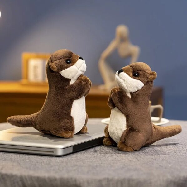S64caef5ca6f947caa439029a3b714c1d7.jpg Petites peluches adorables en forme de loutre
