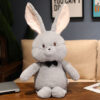 Peluche lapin avec nœud papillon