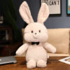 Peluche lapin avec nœud papillon