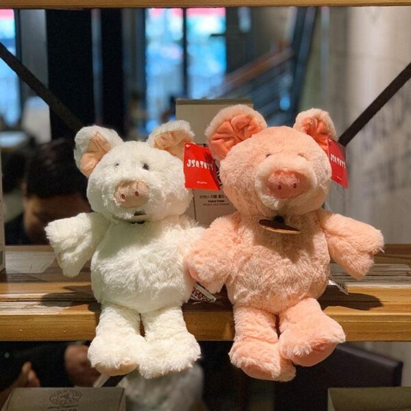 bdfaaf2eaa970510129f658af0876050_07bc14f4-763b-457f-8d94-26a66efcefc7.jpg Jouets en peluche 9" Animaux en peluche cochons blancs et roses de dessins animés