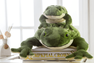 c22f4618d4c084f12015b4ccd3cafd21_52c5ef45-0b29-48d7-a823-4f2916736828.png Poupée en peluche grenouille pour enfants