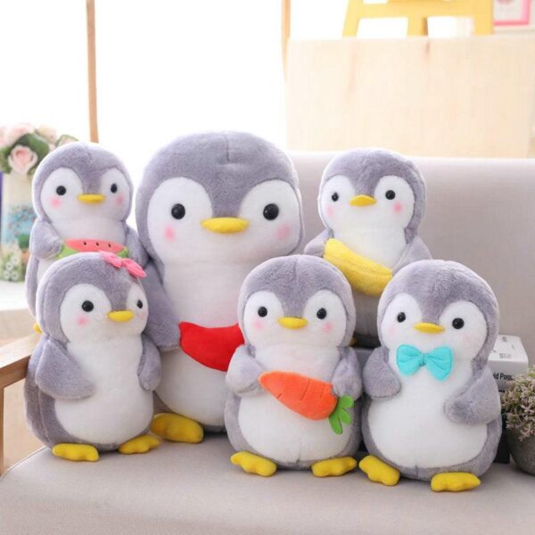d3421a8c-e958-411a-be0f-f95554ae674c.jpg Peluche pingouin
