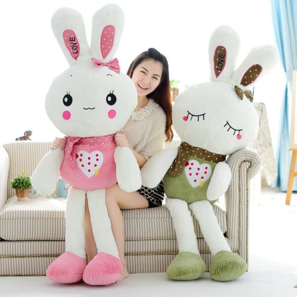 d501d70c82cd62c5af8c5fea7f548768_6d696906-9604-4e98-8ab0-ab42a19d1497.jpg Peluche Peepy Bunny rose géante de 31 pouces