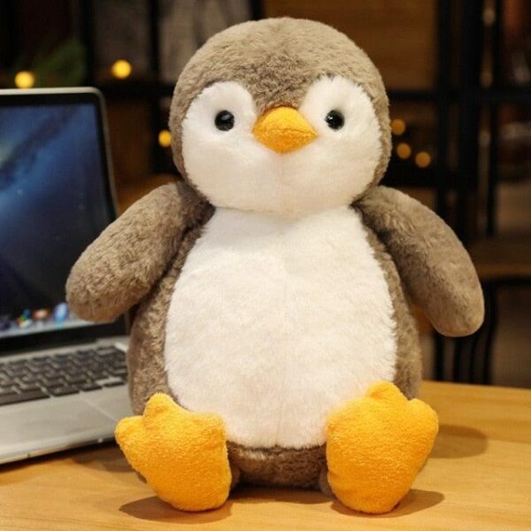 d63e3c10-097f-4c7b-a8e2-65b2969f480c_6a08320d-f8d8-4465-b0ae-61ad55f7fee2.jpg Peluche pingouin mignon et câlin