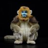 Peluche singe doré réaliste assis