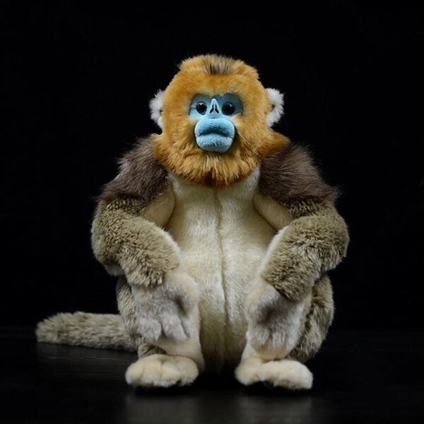 Peluche singe doré réaliste assis