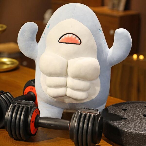 f2cb28f3-0bda-47d7-b3ee-ec5038b653d2.jpg Peluche requin musclé