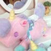 Licorne magique en peluche attachante