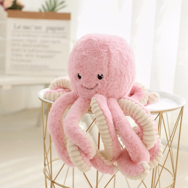 Grosse peluche pieuvre rose pour décorer la chambre