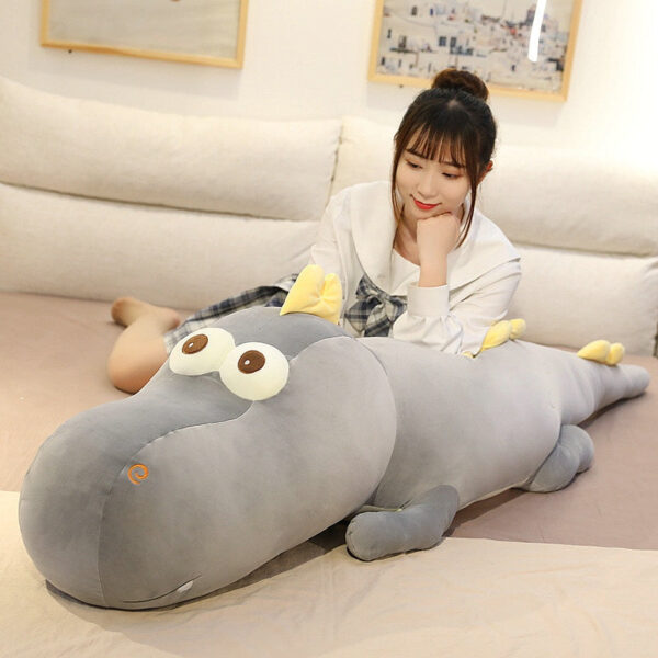 Peluche géante dino aux grand yeux