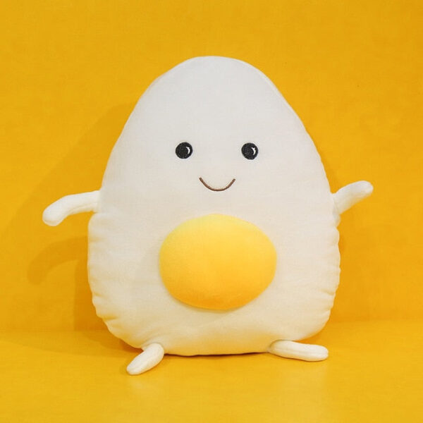 Peluche géante souriante en forme de crane d’œuf