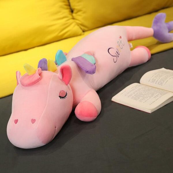 Grand animal en peluche Licorne couchée