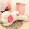 Peluche chien à grandes oreilles avec un coeur d'amour