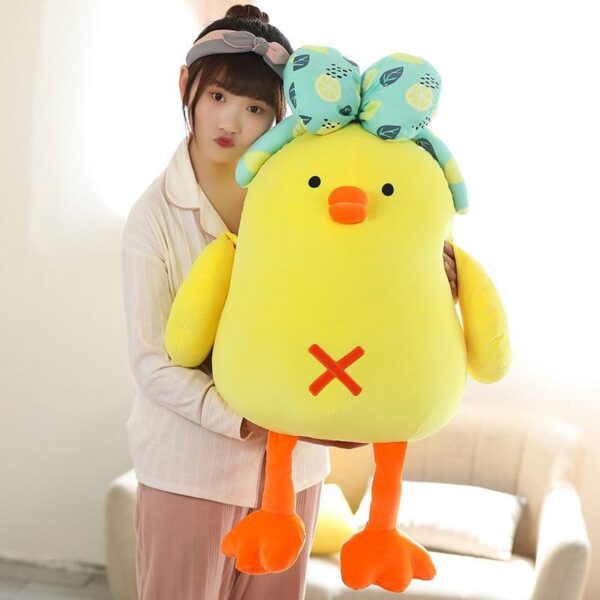 product-image-1795560967_b9373889-3f9a-44c6-9e39-5eb2aaac10f3.jpg Adorable poupée en peluche poulet avec noeud