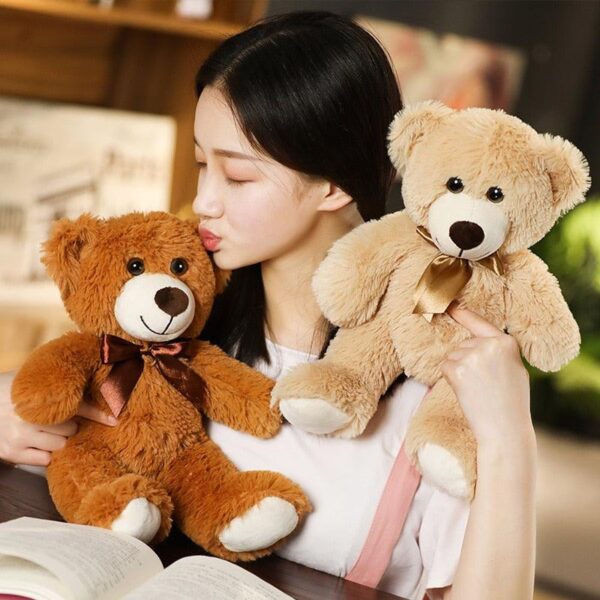 product-image-1889038145_b4d56ea9-8dd6-49af-b737-d1400fc3782d.jpg Poupées ourses à nœud papillon coloré