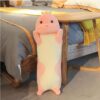 Oreiller long dinosaure en peluche