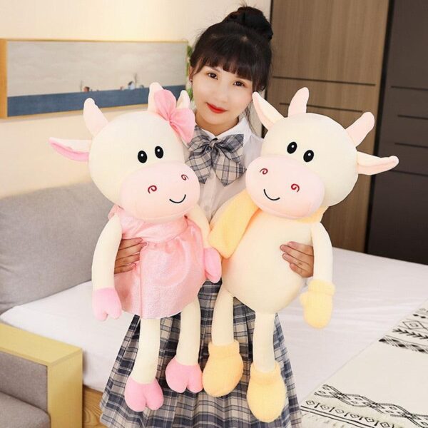product-image-1901636041_bc1507f6-2140-421b-8903-2113f82a23d7.jpg Animal en peluche vache avec jupe