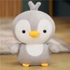 Adorable couple de pingouins en peluche