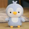 Adorable couple de pingouins en peluche