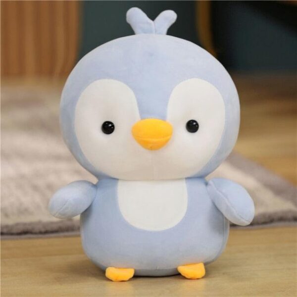 Adorable couple de pingouins en peluche