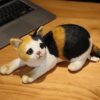 Animaux en peluche en forme de chat couché