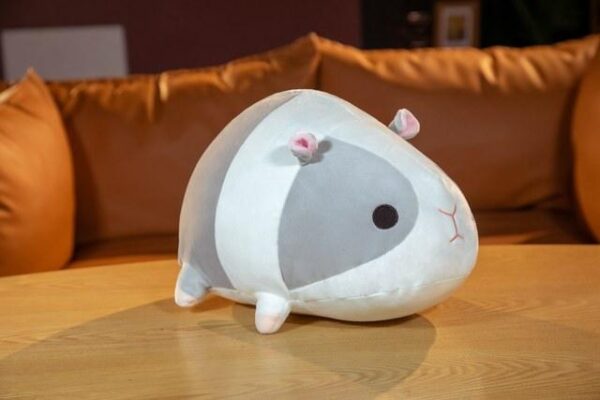 Oreiller en peluche cochon d'Inde gros et couché