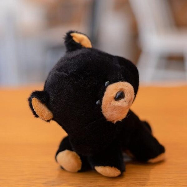 Animaux pelucheux à tête secouée