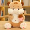 Animaux en peluche tigre assis avec du thé au lait
