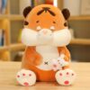 Animaux en peluche tigre assis avec du thé au lait
