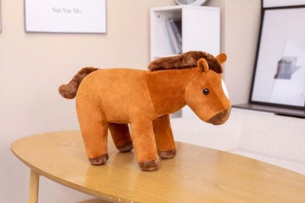 Poupées en peluche cheval assis