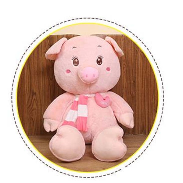cochon rose en peluche assis.jpg