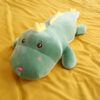 dinosaure peluche yeux brillants.jpg