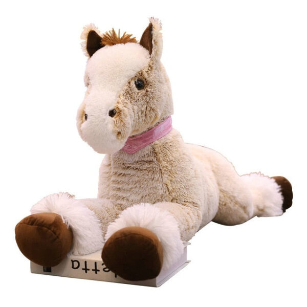 jolie peluche cheval a monter.jpg