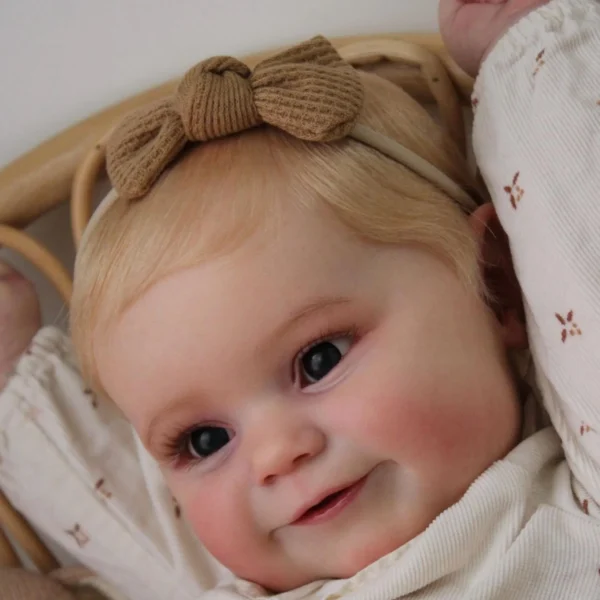 Poupée « reborn » souriante AONPENG